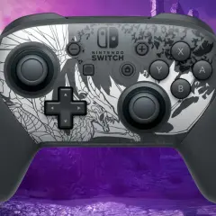Szary pad Nintendo Switch z motywem smoka. Dowiedz się, jak podłączyć pada Nintendo do PC, by cieszyć się grami na większym ekranie.