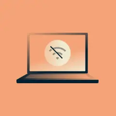 Laptop z symbolem braku połączenia Wi-Fi. Dowiedz się, jak zmienić hasło Wi-Fi w routerze Orange, aby odzyskać dostęp do sieci.