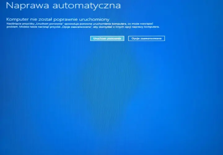 Ekran naprawy automatycznej Windows 10. Komputer nie uruchomił się poprawnie, oferuje opcje "Uruchom ponownie" lub "Opcje zaawansowane" do przywracania systemu.