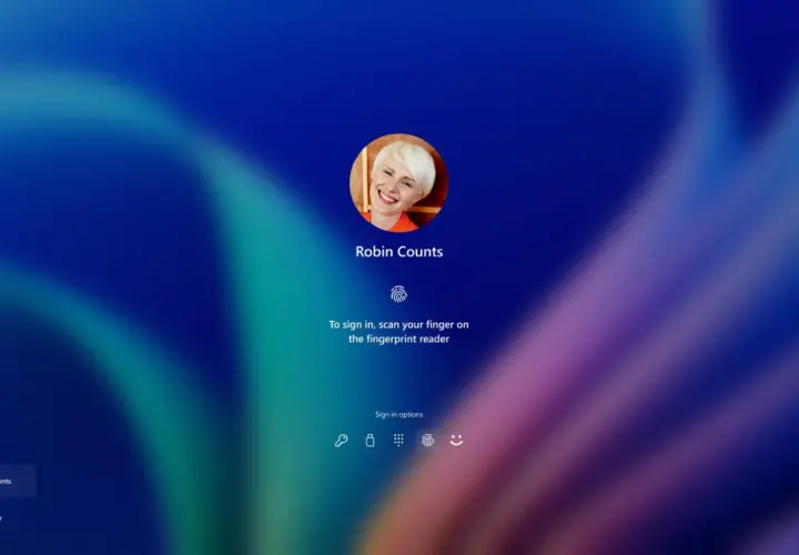 Ekran logowania Windows Hello z uśmiechniętą użytkowniczką Robin Counts, gotową do zeskanowania odcisku palca.