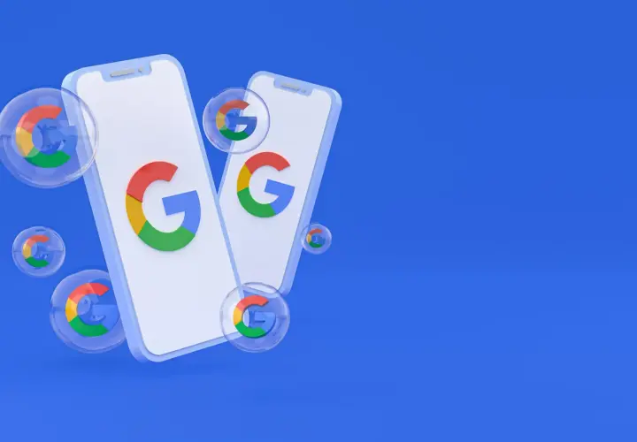 Dwa telefony z logo Google i bańki z tym samym symbolem. Dowiedz się, jak usunąć konto Google.