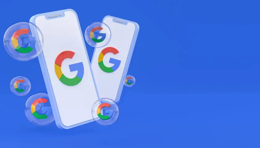 Dwa telefony z logo Google i bańki z tym samym symbolem. Dowiedz się, jak usunąć konto Google.