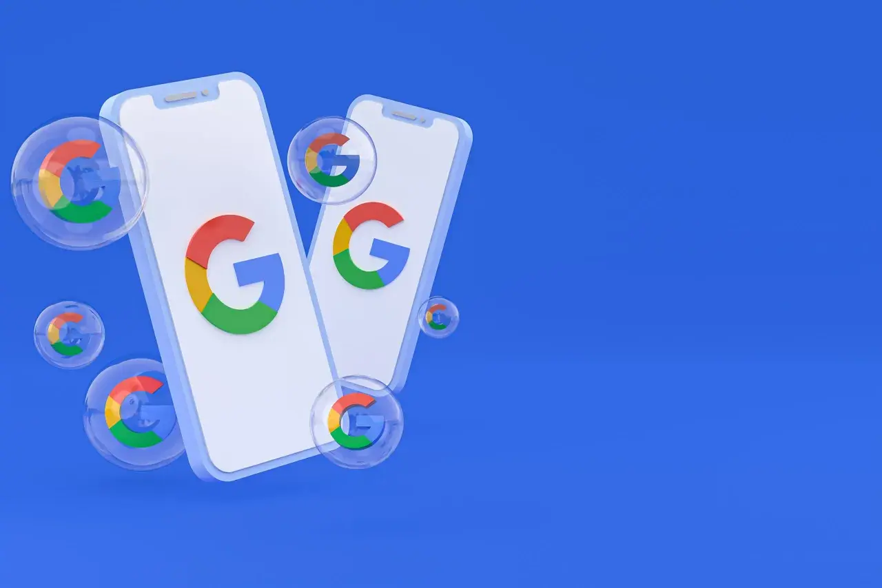 Dwa telefony z logo Google i bańki z tym samym symbolem. Dowiedz się, jak usunąć konto Google.